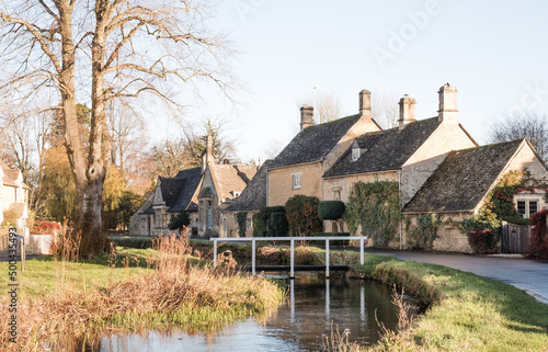 Lower Slaughter In The Cotswolds, England in the afternoon winter sunshine © Peter Greenway