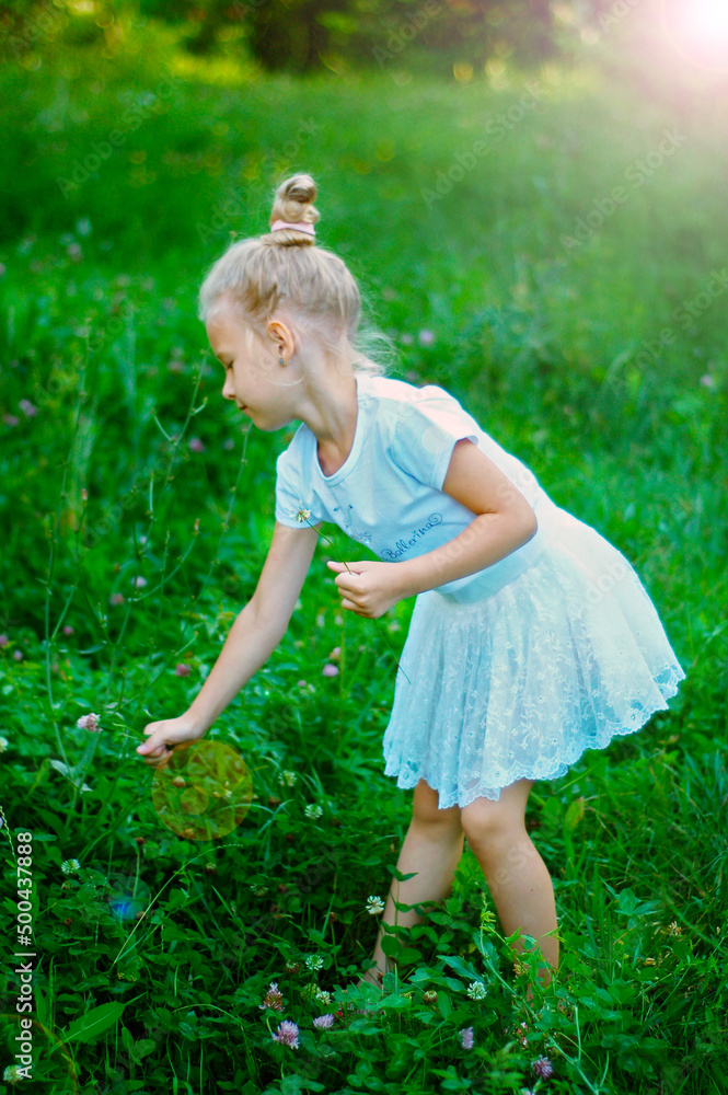 Girl in white clothes among tall grass
Girl in white clothes among tall grass