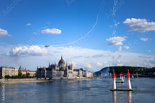 Photography acrobatics at the airshow of sports aircraft with the launch of the house from t