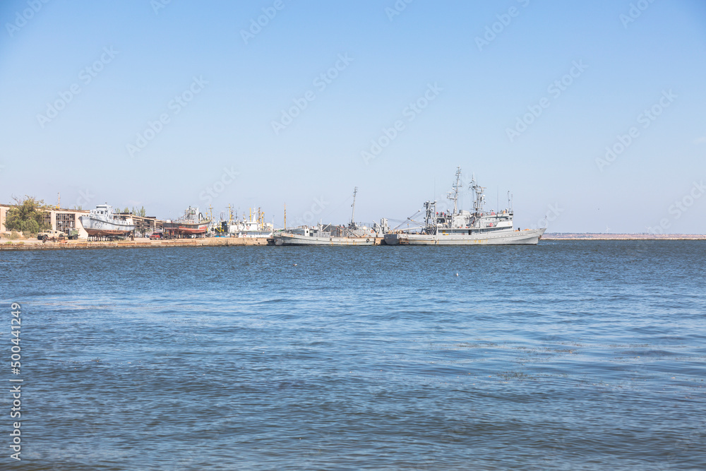 OCHAKIV, MYKOLAIV REGION, UKRAINE - Sept 16 2019: Ukrainian warships and boats near the pier in the Black Sea