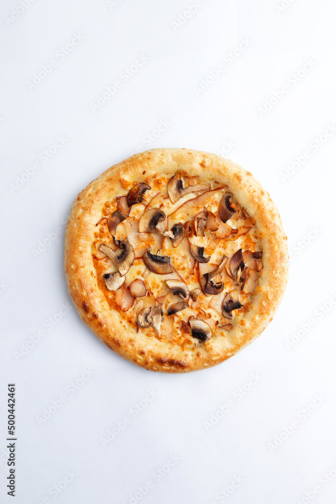 Homemade pizza with cheese and mushrooms. On a white background. Homemade pizza with cheese and mushrooms. On a white background.