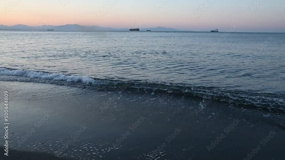 Early morning, dawn over the sea and rocks. Calm peaceful landscape, meditation. City of Vietri. Amalfi Coast, southern Italy Early morning, dawn over the sea and rocks. Calm peaceful landscape, meditation. City of Vietri. Amalfi Coast, southern Italy