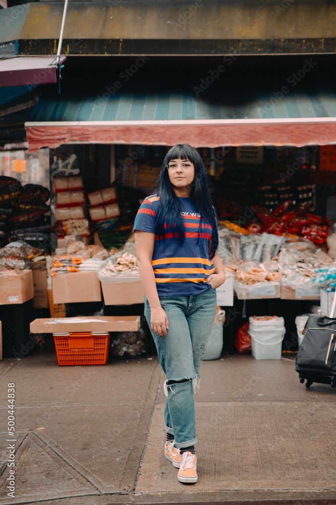 Woman standing near local market Woman standing near local market