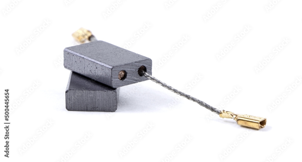 Carbon brushes isolated on a white background. Brushes for electric motor.Spare parts for angle grinders.Graphite brushes Carbon brushes isolated on a white background. Brushes for electric motor.Spare parts for angle grinders.Graphite brushes