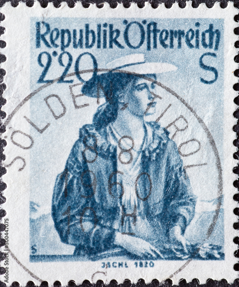 Austria - circa 1952: a postage stamp from Austria, showing a woman with traditional provincial costume. Salzkammergut, Ischl (1820)