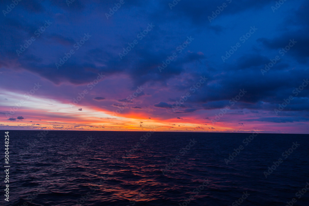 Sky after sunset in the ocean.