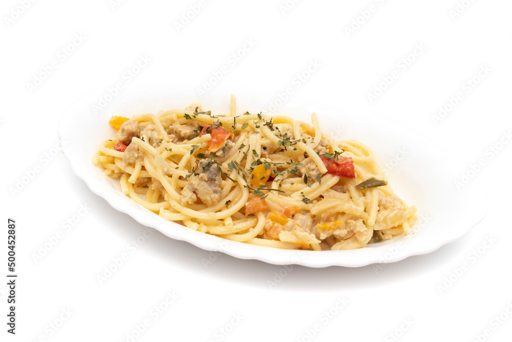 Spaghetti carbonara on a long white plate, isolated on white background. Carbonara is an Italian pasta dish originating from Lazio, and more specifically from Rome. Spaghetti carbonara on a long white plate, isolated on white background. Carbonara is an Italian pasta dish originating from Lazio, and more specifically from Rome.