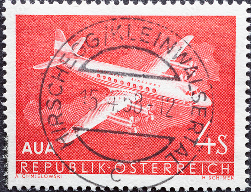 Austria - circa 1958: a postage stamp from Austria, showing a propeller plane. First Flights of the Austrian Airlines photo