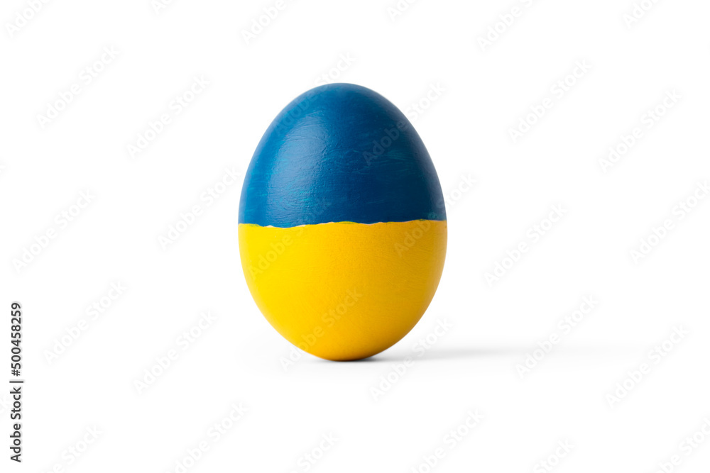 Easter egg blue and yellow on Ukraine flag colors as concept for war Ukraine
