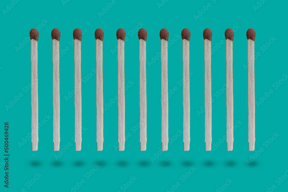 row of the wooden matches in the air on colorful background row of the wooden matches in the air on colorful background