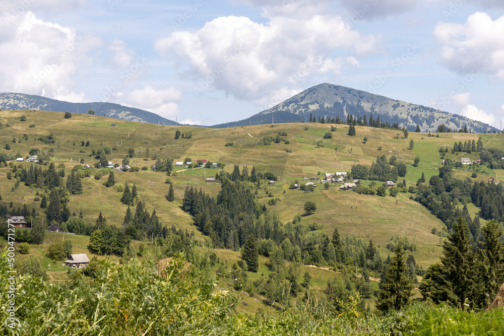 Panorama of mountains in the Ukrainian Carpathians on a summer day.