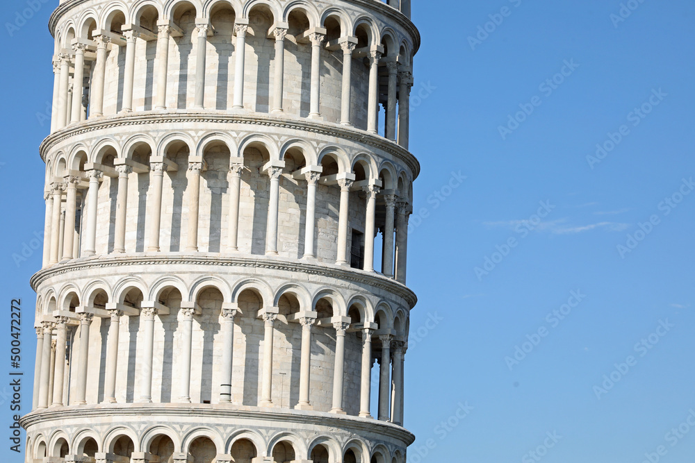 Pisa, PI, Italy - August 21, 2019:  detail of Leaning Tower and white balusters