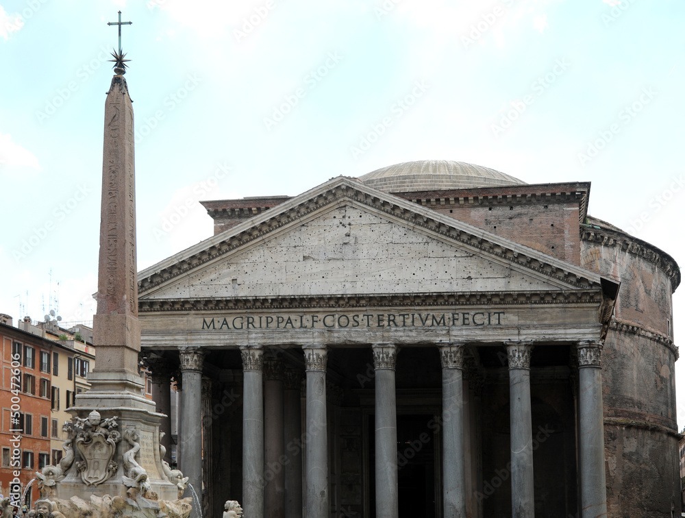 Rome, RM, Italy - August 16, 2020: Ancient Roman Temple called Pantheon and the Obelisk and latin roman Text that means Marco Agrippa son of Lucio, consul for the third time, built
