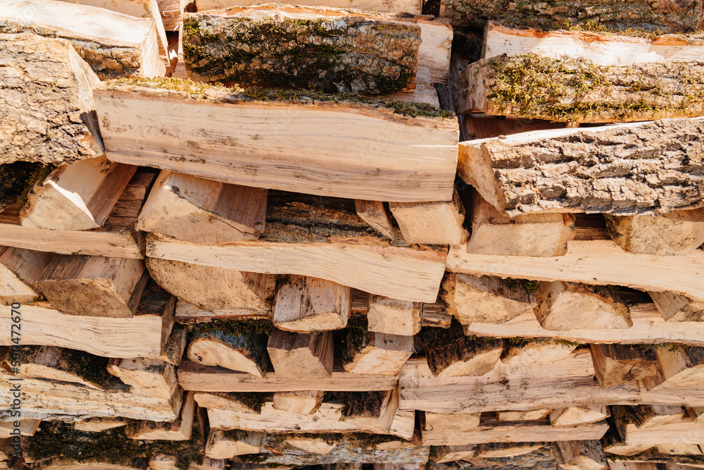 Logs. stacked firewood for kindling a fireplace or barbecue. Logs. stacked firewood for kindling a fireplace or barbecue.