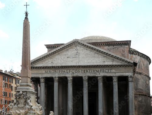 Rome, RM, Italy - August 16, 2020: Ancient Roman Temple called Pantheon and the Obelisk and latin roman Text that means Marco Agrippa son of Lucio, consul for the third time, built