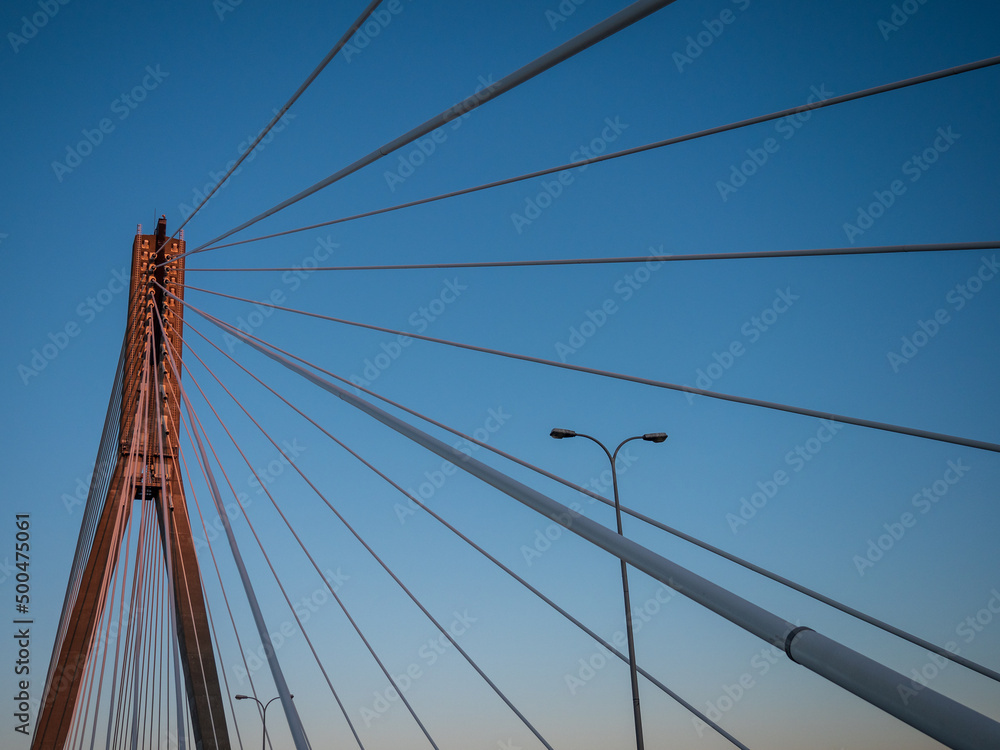Warsaw, Poland - December 2021: View of the Świętokrzyski Bridge, Cable-stayed road bridge Warsaw, Poland - December 2021: View of the Świętokrzyski Bridge, Cable-stayed road bridge