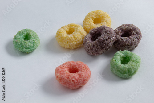 Delicious and nutritious fruitloops colorful breakfast cereal without milk and on white background