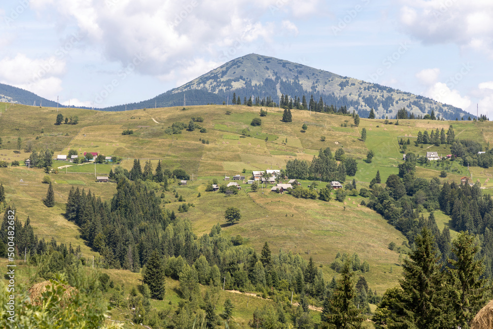 Panorama of mountains in the Ukrainian Carpathians on a summer day.