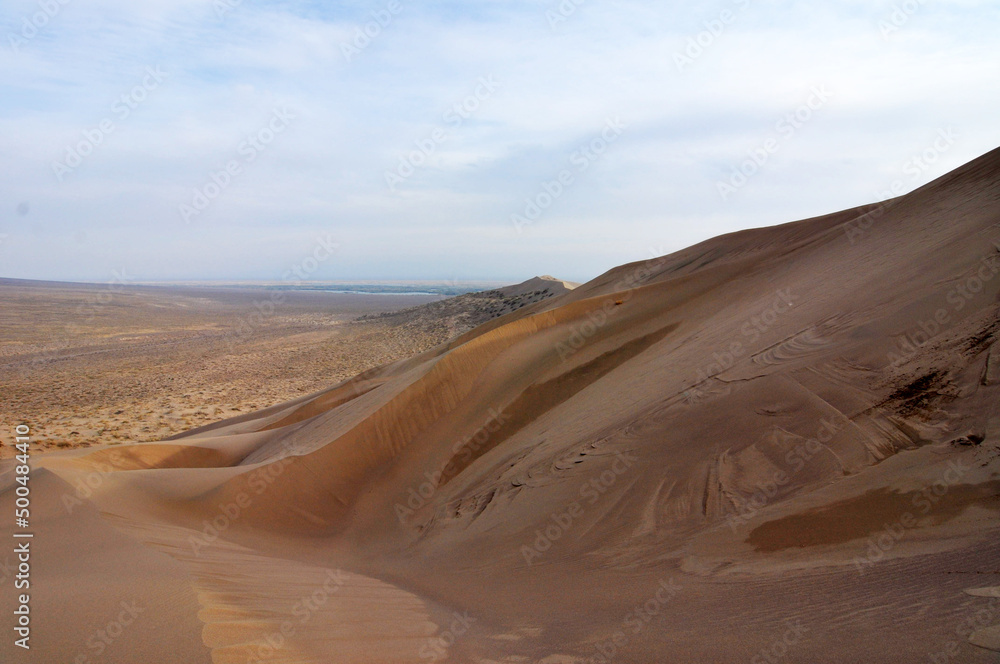 Naklejka premium Kazakhstan.The Singing Dunes (also known as Singing Barchan).