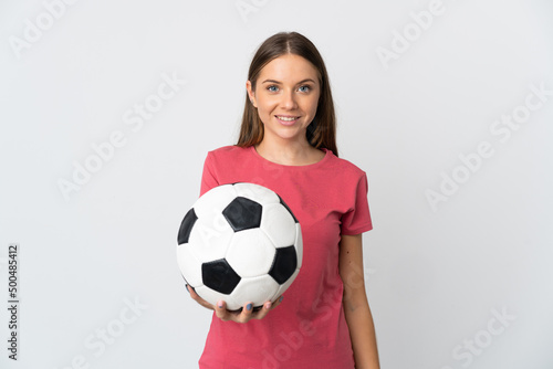 Young Lithuanian woman isolated on white background with soccer ball © luismolinero