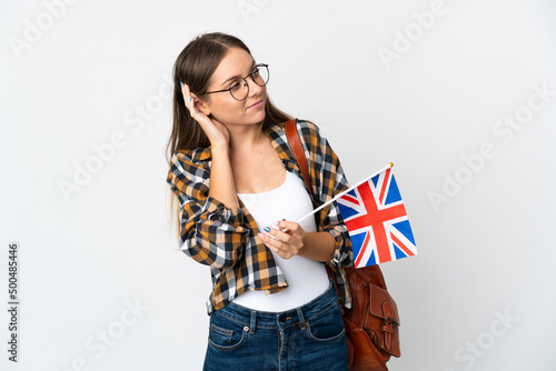 Young Lithuanian woman holding an United Kingdom flag isolated on white background thinking an idea