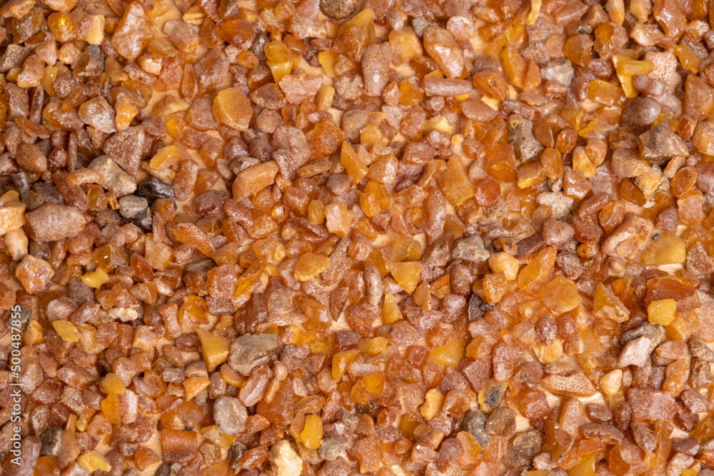 Small amber. Selective focus. Close-up, background and texture Small amber. Selective focus. Close-up, background and texture