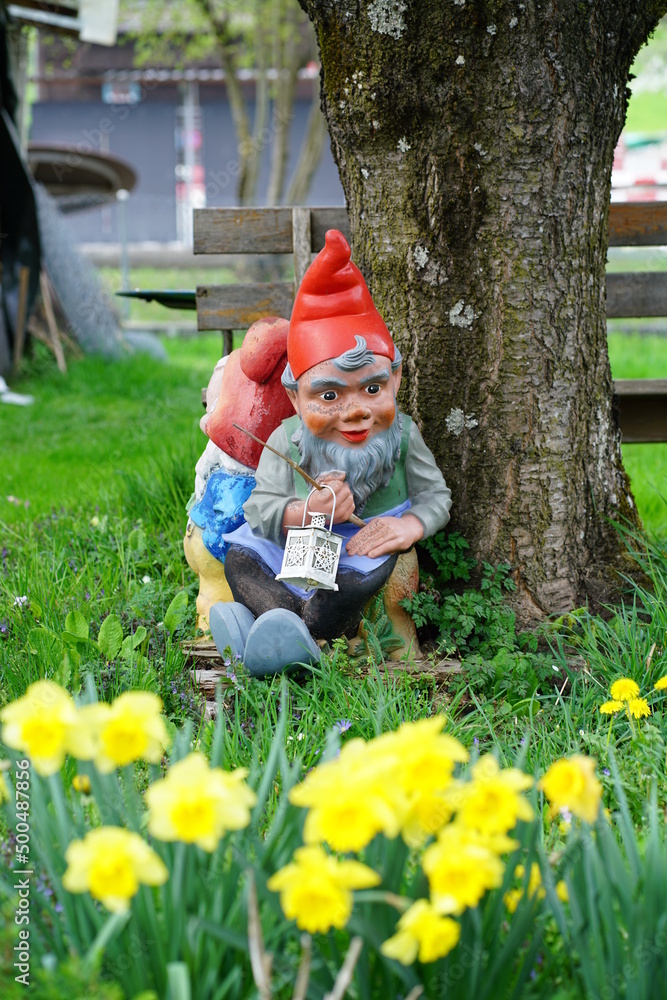 Two gnomes in the garden in spring, Switzerland
