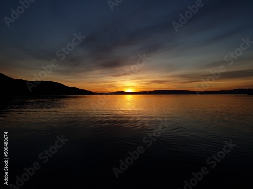 sunset over the mountains and water - Trondheim © Mariusz