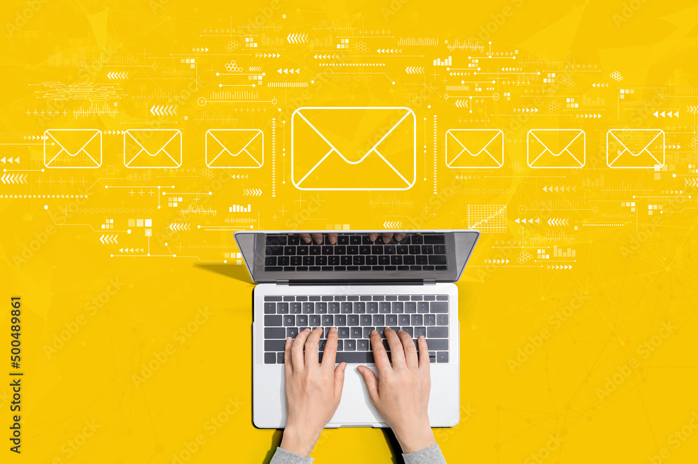 Email concept with person using a laptop computer - obrazy, fototapety, plakaty 