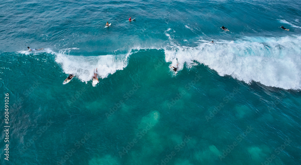 Aerial view of surfers waiting for the wave. Sri Lanka, Midigama. High quality photo Aerial view of surfers waiting for the wave. Sri Lanka, Midigama. High quality photo