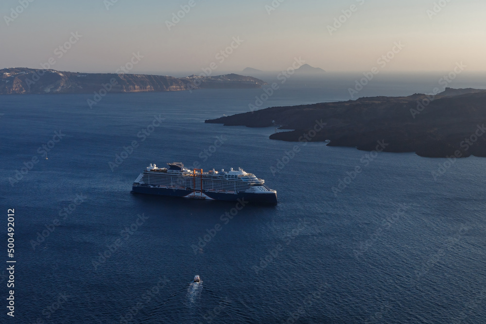 Cruise liner near the caldera of Santorini island