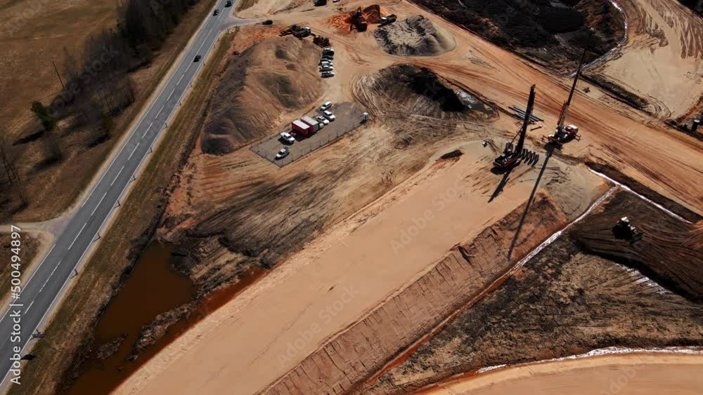 Revealing shot: Construction of new highway road in Europe aerial Revealing shot: Construction of new highway road in Europe aerial