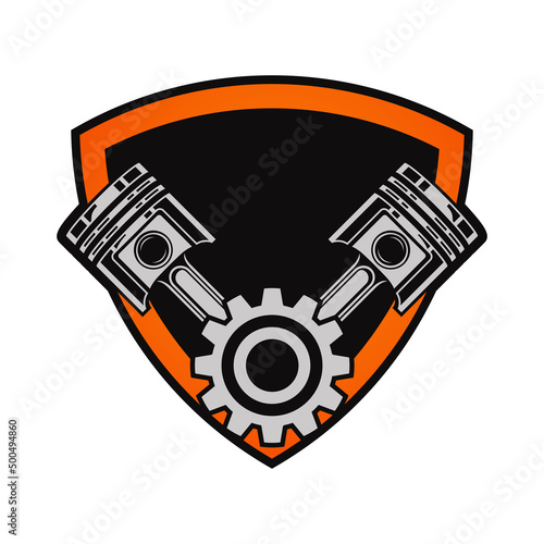emblem shield with piston and gear.