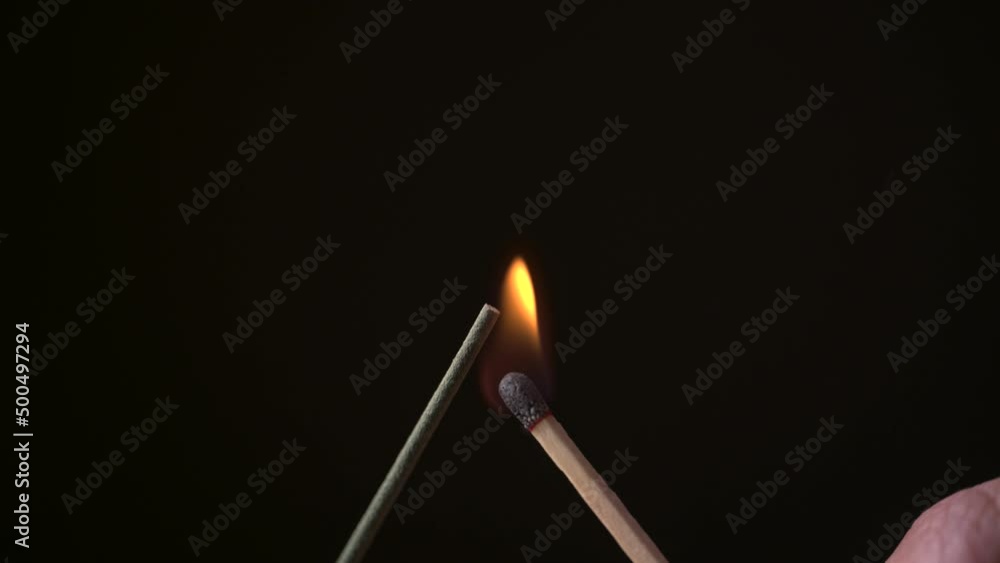 firing up incense with match firing up incense with match