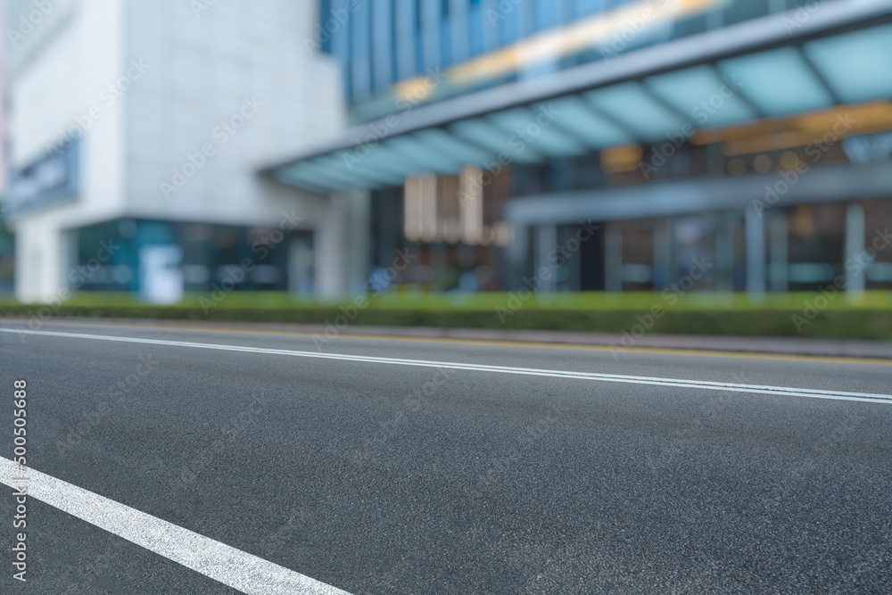 empty urban road with modern building in the city.