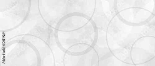White abstract background with white circle rings in faded distressed vintage grunge texture design, old geometric pattern paper in modern art design