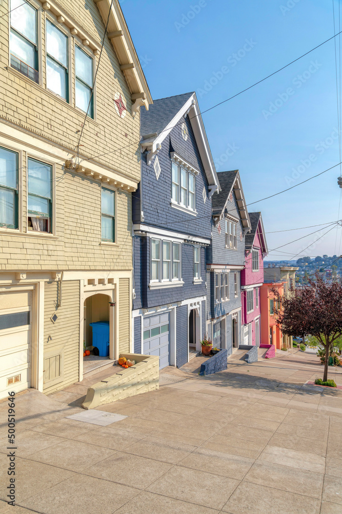 Suburbs houses with colorful painted wood sidings in San Francisco, California Suburbs houses with colorful painted wood sidings in San Francisco, California