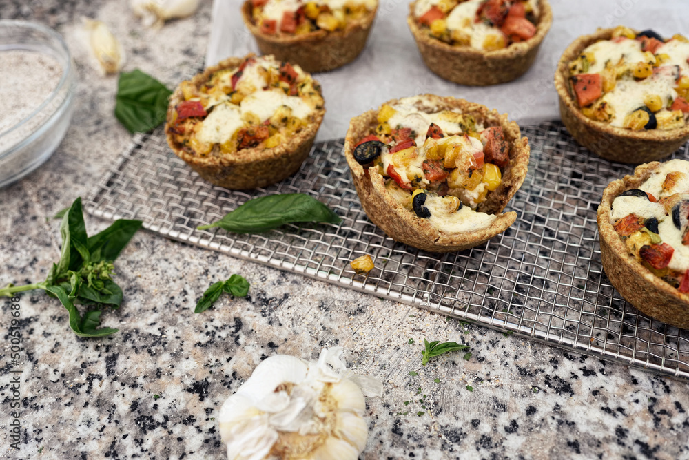 Protein breakfast egg muffins with bacon and vegetables. Low carb diet breakfast.