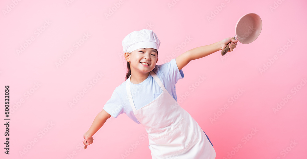 Naklejka premium Image of Asian child practicing to be a chef