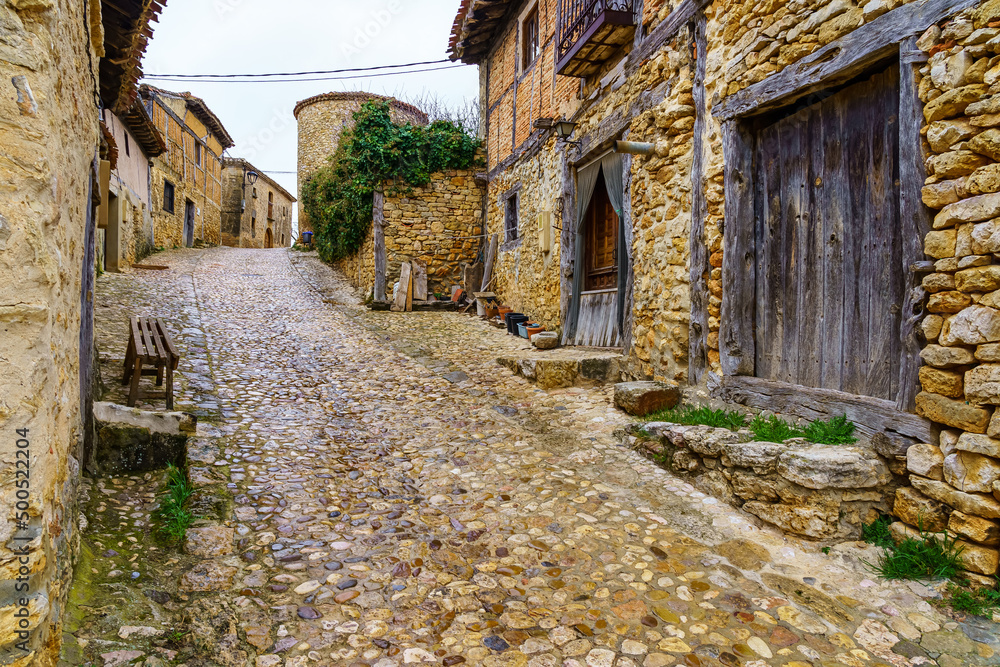 Picturesque view of old village alley in Calatanazor, Soria. Picturesque view of old village alley in Calatanazor, Soria.