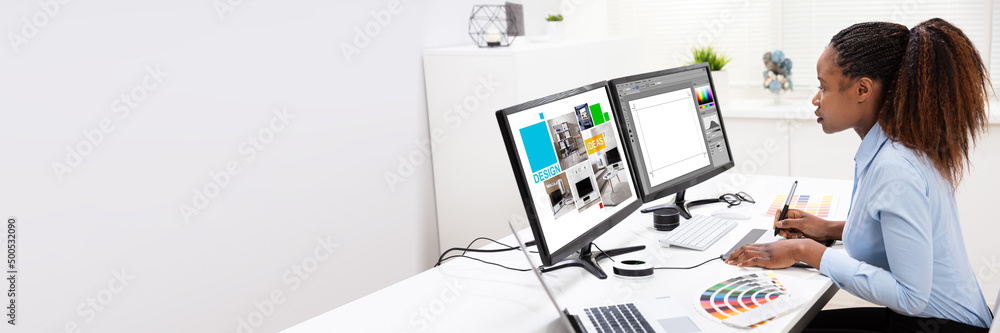 © Andrey Popov - Designer Editing Photos On Computer © Andrey Popov - Designer Editing Photos On Computer