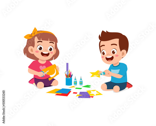 little kid cut paper for art with friend
