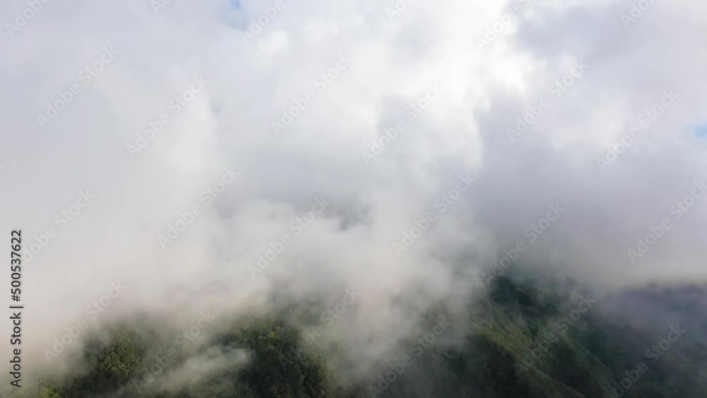 Clouds over green forests , Asia, Philippines, Ifugao, Luzon, towards Banaue, in summer on a sunny day. Clouds over green forests , Asia, Philippines, Ifugao, Luzon, towards Banaue, in summer on a sunny day.