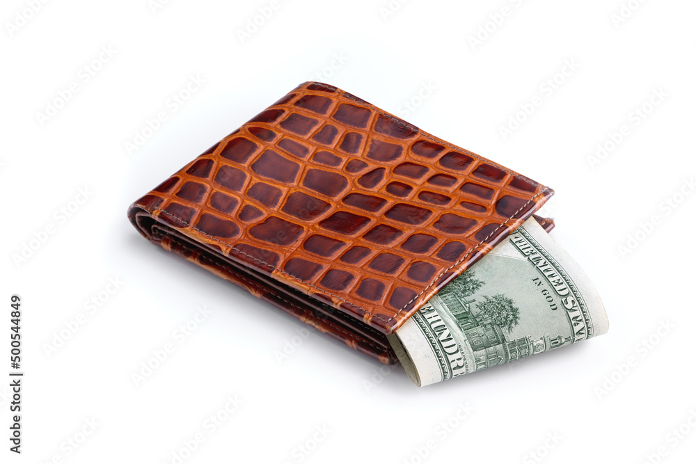 Lots of american hundred dollar bills in a leather wallet. Has a clipping path saved. Lots of american hundred dollar bills in a leather wallet. Has a clipping path saved.