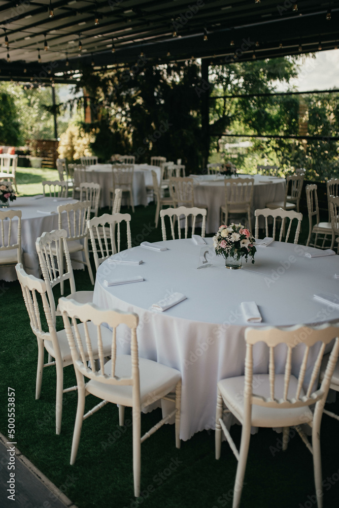 Fototapeta premium Table setting for an event party or wedding reception.
