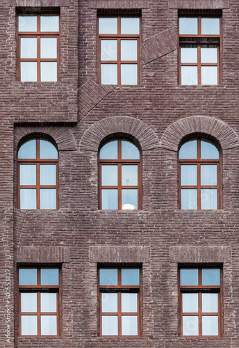 Several windows in a row on the facade of the modern urban apartment building front view, Krasnaya Polyana, Sochi, Krasnodar Krai, Russia
