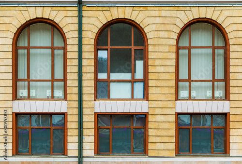 Several windows in a row on the facade of the modern urban apartment building front view  Krasnaya Polyana  Sochi  Krasnodar Krai  Russia 