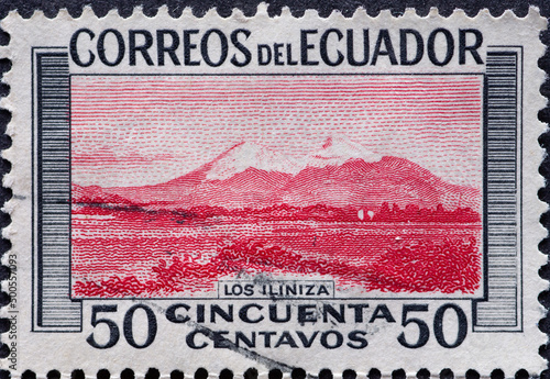 Ecuador - circa 1960: a postage stamp from Ecuador, showing the landscape at the Iliniza Mountains photo