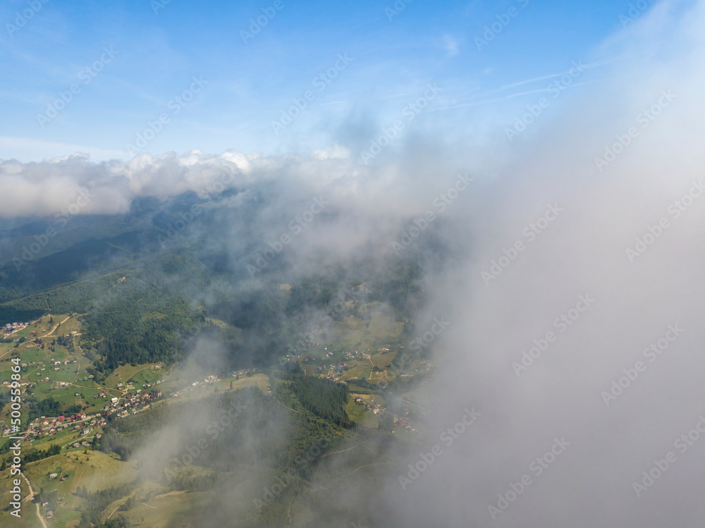 High flight in the mountains of the Ukrainian Carpathians. Aerial drone view.