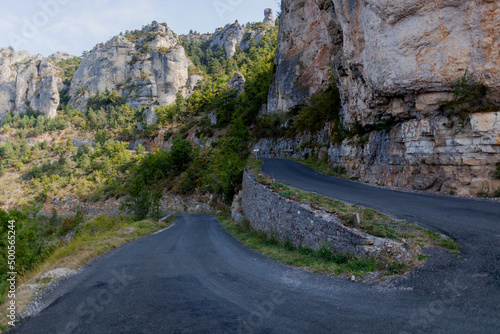 One of a series of sharp bends in the road coming down a steep cliff in the Tarn Gorge.